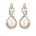 INTRIGUING ROUND PEARL DROP SILVER EARRINGS