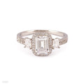 EXTRAVAGANT EMERALD CUT HALO SILVER RING