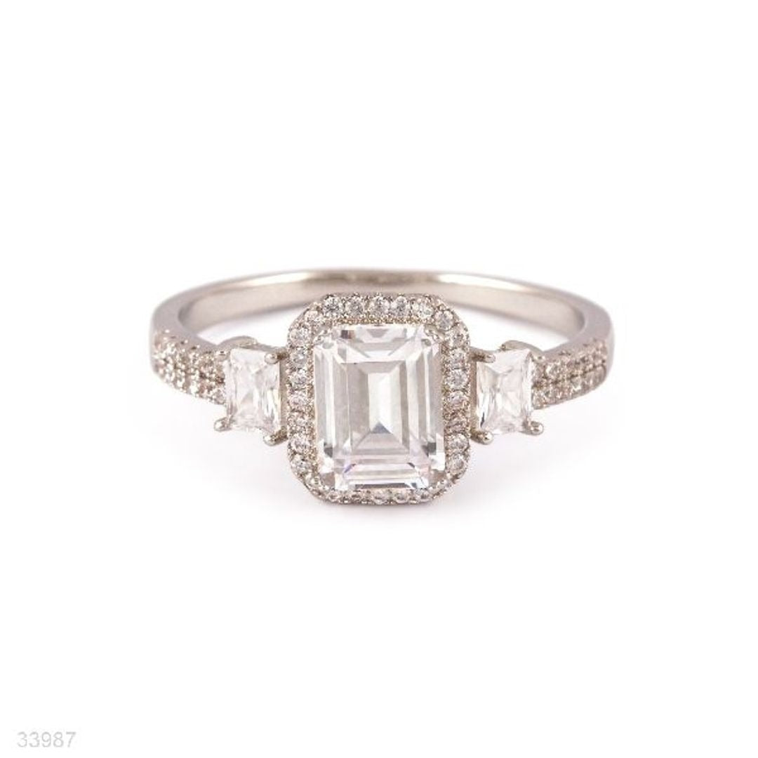 EXTRAVAGANT EMERALD CUT HALO SILVER RING